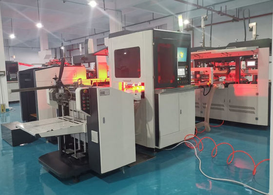 एलएस 450 एस बॉक्स पोजिशनिंग मशीन जिसका उपयोग मोबाइल फोन बॉक्स बनाने के लिए कागज पर भीतरी बॉक्स को चिपकाने के लिए किया जाता है।