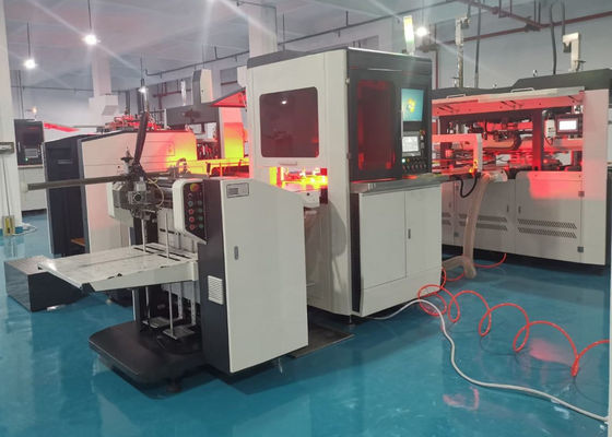 एलएस 450 एस बॉक्स पोजिशनिंग मशीन जिसका उपयोग मोबाइल फोन बॉक्स बनाने के लिए कागज पर भीतरी बॉक्स को चिपकाने के लिए किया जाता है।